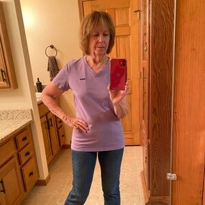 10/10$ bundle 10 (4-5$) items for a 10$ offer. Reebok Lavender V-Neck Tee.i